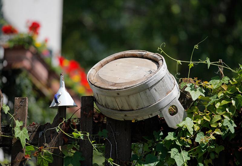 wooden bucket on the fence